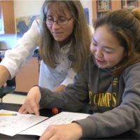 Diane instructing a student at Scammon Bay, AK